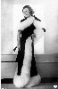 Lillian Harvey in fox trimmed dress 58 Kb